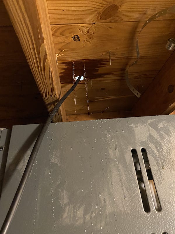 A giant leak in my roof, viewed from the inside of the attic